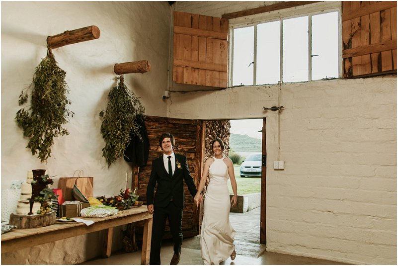 bridal couple entering the wedding venue